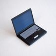 5272578ecae1fc8d24fce00dc9448dea_display_large.jpg Multi-Color Miniature Laptop