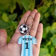 20240210_131445.jpg Key ring argentina soccer jersey with ball / Souvenir argentina jersey