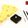 2.jpg Wall clock in the form of a slice of cheese