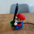 1000014624.jpg Mario Phone Holder