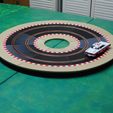 Marvin_going_around_in_circles.JPG R1.5 cambered curve - slot car track and borders - Scalextric