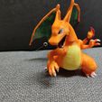 * 4 ‘ ¢ . ¢ * * 4 + ‘ + ; 3 >> Charizard Articulated
