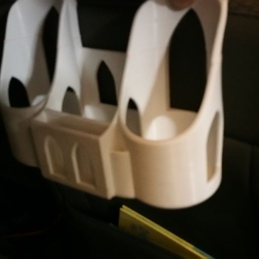 2019-07-13_22.23.18.jpg Back of headrest cup holder/organizer