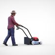 Man-with-LM.1.13.jpg Guy with Lawnmower gardener or construction worker