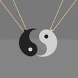 collier-ying-yang-1.jpg Complementary yin yang necklace.