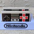 95abf6ceebdbc86a11647a0233d98564_display_large.jpg 8Bitdo NES30 Controller Holder