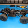 battery_tray_stock_chassis.jpg SCX24 Front Shock and Accessory / Battery Mount