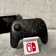 WhatsApp-Image-2024-10-09-at-13.48.19-1.jpeg Nintendo Switch - PRO CONTROLLER STAND -DISPLAY Switch LOGO