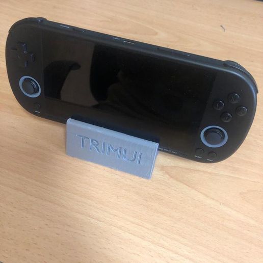 WhatsApp_Image_2025-01-26_at_13.34.01_20231f00.jpg TRIMUI SMART PRO Stand