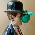 M.jpg Surrealist Mystery Bust – Magritte-Inspired 'Son of Man' Sculpture
