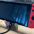 switch-incl-jack.jpg Nintendo Switch + mobile phone stand