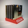 64fc4512ecff0098ce53751c295a3543_display_large.jpg Free STL file NES Cartridge Stand 5 Slot・Object to download and to 3D print