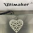 IMG_4110.jpg Free STL file Geometric heart earrings・3D print design to download