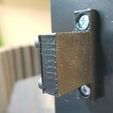 Magnetic_Bracket_Screw_Cap_Installed_Open_Front.jpg Magnetic bracket for doors and enclosures
