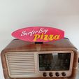 1658653455915.jpg Surfer Boy Pizza Logo Sign with Stand Stranger Things 4