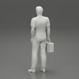 3DG-0010.jpg paramedic Standing And Holding first Aid box