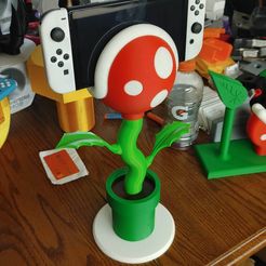 351726136_802709314396032_8739173050823304517_n.jpg Archivo STL Nintendo Switch Plant Stand Mini (Carga)・Objeto imprimible en 3D para descargar