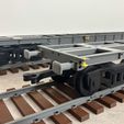 Train-Container-Wagon-2.jpg Железнодорожный контейнерный вагон — 40 футов / 60 футов с поворотными замками — масштаб 1:14