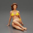 3DG-0001.jpg Femme sexy assise en bikini sur la plage