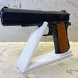 IMG_2354.jpg A demonstration stand for Colt 1911