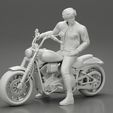 3DG-0007.jpg Young man sitting on his motorbike - Separated and non separated