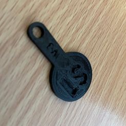 IMG_0855_copy.jpg Australian $1 shopping trolley token with attachment hole
