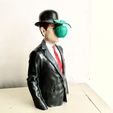H.jpg Surrealist Mystery Bust – Magritte-Inspired 'Son of Man' Sculpture