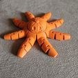 WhatsApp-Image-2023-09-07-at-09.02.56.jpeg Osmia Articulated Angry Happy Pumpkin Octopus Spinning Fidget Toy