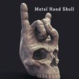 2.jpg Metal Hand Skull