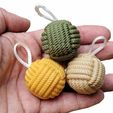 63b5a5c6-c39d-4dd1-bc38-256e71d5c6d9.jpg Paracord ball keychain
