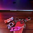 C7B1BA18-B6BF-42EA-91BA-3CC47B27C259.jpeg 2023 Fidget Keychain