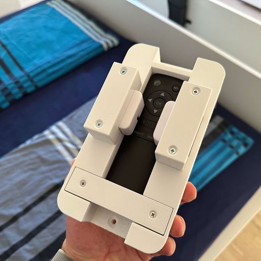 Anleitung:-Versteckter-TV-via-Apple-Home-über-einen-TV-Lift-bedienen2.jpg SwitchBot holder for remote control