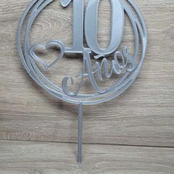 WhatsApp-Image-2023-11-28-at-08.22.20-1.jpeg cake topper 10 years