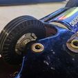 588d9fbe-697a-4cd1-b228-09308d8778a0.jpg Replacement wheel for vintage tin toy car