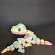 dinosaure-articulé.jpg Cute Flexi Tiny T-rex print in place no support