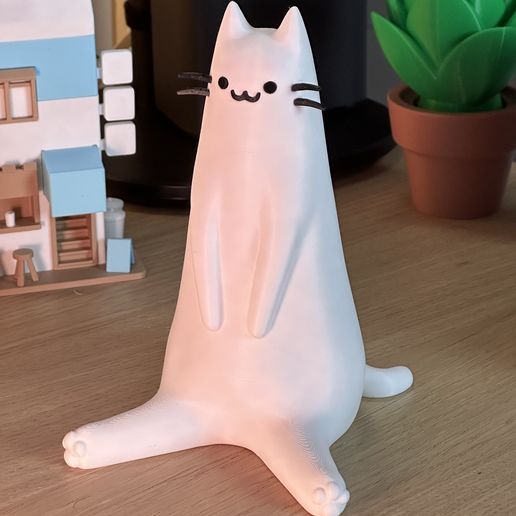 0A72CBDA-1614-470B-8096-F5E972F9F98D.jpeg Sitzende Katze Dekor