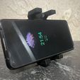 1000172372.jpg Suporte universal para um smartphone.