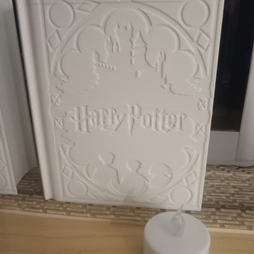 photo_8_2025-04-16_19-15-53.jpg Lámpara libro Harry Potter