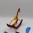 PXL_20260216_203935332.jpg Alice in Wonderland rocking horse figurine