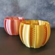 vase-2.jpg Orange planter with stripes
