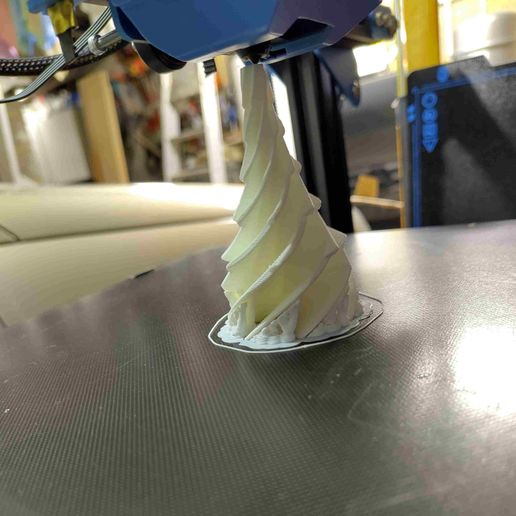 printing-snow.jpg Twisted heptagon christmas tree with pass through snow