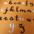IMG_20210316_173218.jpg alphabet in cursive letters