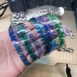 20231112_024630-1.jpg Turtle Keychain (made from recycled bottles)