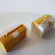20240421_155439.jpg A box of toothpicks in the shape of a treasure chest