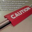 e1ba9eed0054e10d9c0f34f479ed52ef_display_large.jpg 'CAUTION Cable Cover'