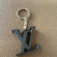 418592053_1433072237297184_8367934056510462071_n.jpg Lous Vouitton keychain (one color)