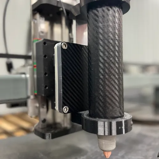 HMT47-assy4.webp Fits JD's garage plasma table Z axis. 3D printed machine torch body for Hynade CUT60DN (should fit other non HF blow back type plasma).