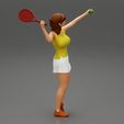 Girl-0002.jpg Woman playing tennis giving service throwing ball