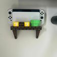 Imagen-de-WhatsApp-2023-08-08-a-las-12.15.45.jpg MARIO WORLD - NINTENDO SWITCH WALL AND TABLE STAND WITH DOCK + 25 GAMES