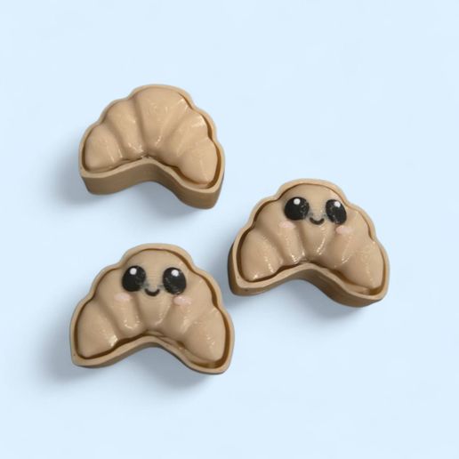 647507584_10164204546879548_6856860127827648409_n.jpg Happy Little Croissant Clicker Fidget and Keychain